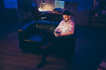 Sticker - Full length body size photo of concentrated focused man sitting with laptop writing code to new software in spectacles