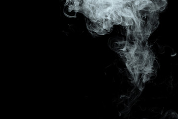 Wall Mural - Abstract powder or smoke effect isolated on black background