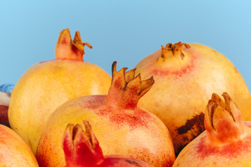 Sticker - Group of pomegranate fruits close up background