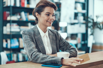 Wall Mural - Using payment card in favorite cafe stock photo