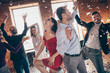 © deagreez - Profile photo of group friends dance floor spending x-mas party together couple dancing back-to-back excited favorite song confetti air wear formalwear dress shirts indoors