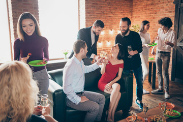 Poster - Photo of best friends celebrating birthday party telling festive toasts clinking glasses drink golden wine eating snacks corporate company wear formalwear sofa restaurant indoors