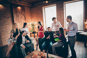 Wall Mural - Photo of eight members group festive birthday party people friendship chatting clinking glasses drink golden wine eating snacks wear formalwear restaurant indoors