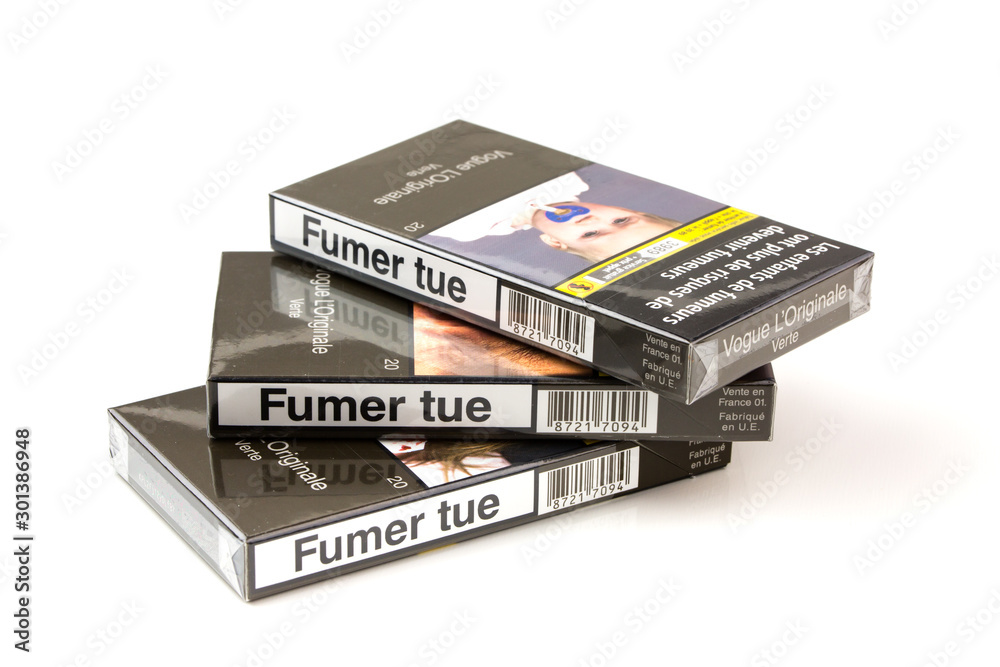 skinny cigarettes france Vogue brand thin cigarettes packages isolated on white background  Stock-foto