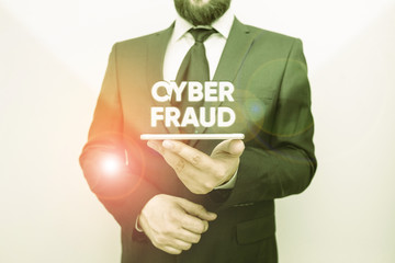 Wall Mural - Word writing text Cyber Fraud. Business photo showcasing any crime that is committed with the use of a computer Male human wear formal work suit hold smart hi tech smartphone use one hand