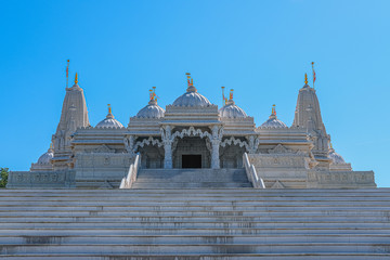 Canvas Print - View of a white marble hindu temple