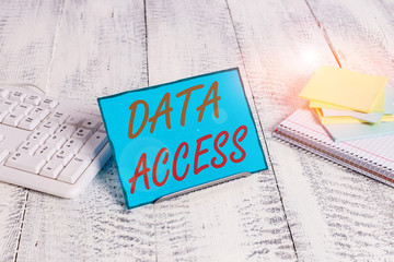 Word writing text Data Access. Business photo showcasing a user s is ability to access data stored within a database Notepaper stand on buffer wire in between computer keyboard and math sheets