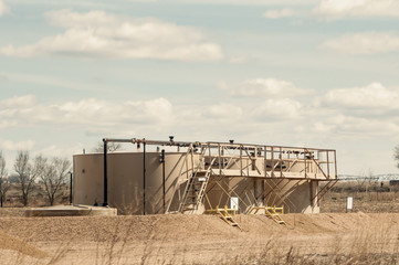 Crude oil tanks for storage to be unloaded into trucks.