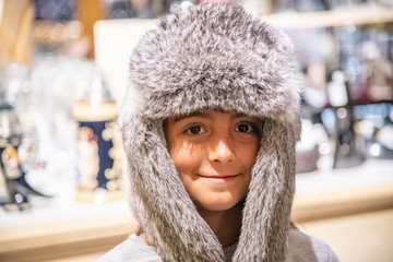 Poster - Young girl wearing iceland hat with fur