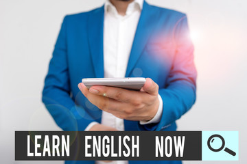 Poster - Writing note showing Learn English Now. Business concept for gain or acquire knowledge and skill of english language Business concept with man holding mobile phone with touch screen