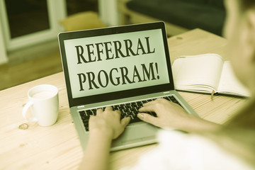 Poster - Word writing text Referral Program. Business photo showcasing employees are rewarded for introducing suitable recruits woman laptop computer smartphone mug office supplies technological devices
