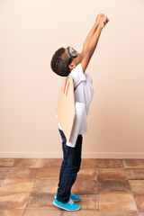 Poster - African American boy  with aviator hat and with wings