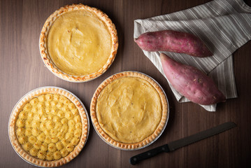 Wall Mural - sweet potato pie on wooden background