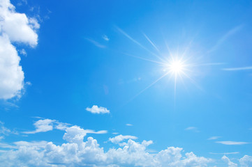 blue sky background with clouds. clouds and sun