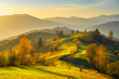 Autumn landscape with mountains at sunset