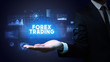 © ra2 studio - Hand of Businessman holding FOREX TRADING inscription, business success concept