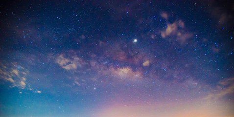 panorama blue night sky milky way and star on dark background.universe filled, nebula and galaxy wit