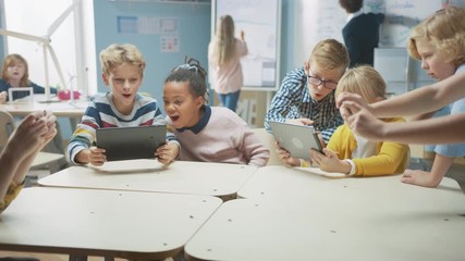 Poster - Elementary School Computer Science Class: Children Use Digital Tablet Computers and Smartphones with Augmented Reality Software, They’re Excited, Full of Wonder. Children in STEM, Playing and Learning