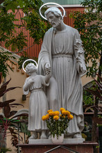 Statue Of St. Joseph And The Child Jesus.  The Huyen Sy Church, Saigon, Vietnam.