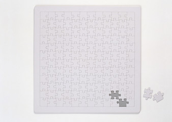 Wall Mural - blank Jigsaw isolated on white background