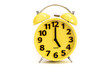 Yellow alarm clock on white at 5 o'clock