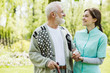 © Photographee.eu - Senior man with helpful volunteer in the garden of professional care home