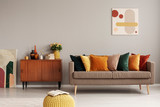 Fototapeta Przestrzenne - Retro style in beautiful living room interior with grey empty wall