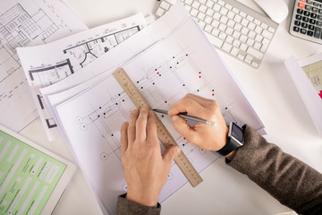 Aufkleber - Overview of hands of engineer with pencil and ruler drawing line on sketch