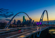 Dallas skyline at twilight over bridge