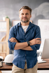 Poster - Bearded smiling engineer with arms crossed on chest standing in front of camera