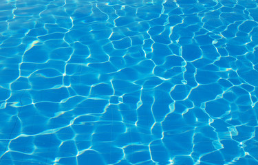  surface of blue swimming pool,background of water in swimming pool.