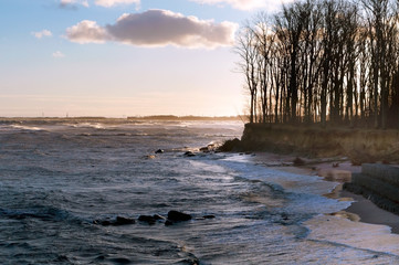 sea waves red from sunlight, sunset on the sea