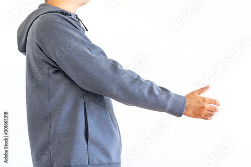 握手を求める灰色のジャージを着た男性 Stock Photo Adobe Stock
