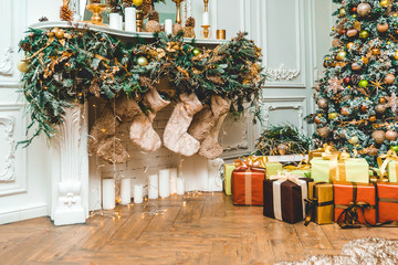 New Year 's Eve decorated with toys green tree with gifts standing with fireplaces