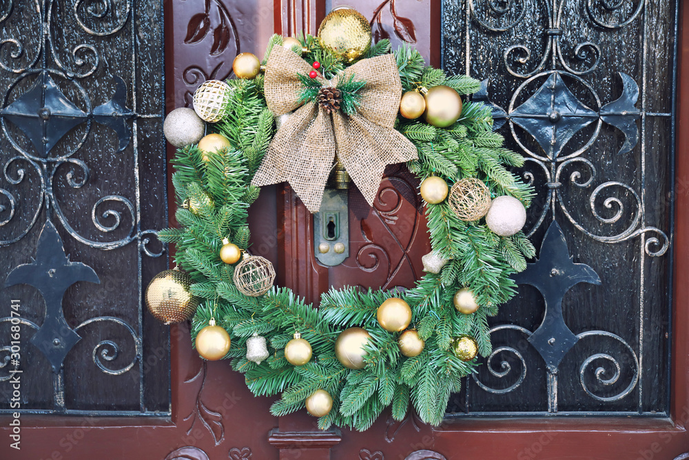 Beautiful Christmas wreath hanging on door
