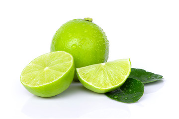 Sticker - Fresh Lime fruits and green leaf isolated on white background.