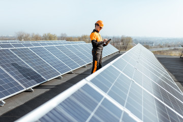 Wall Mural - engineer on a solar power plant
