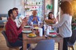 © Krakenimages.com - Beautiful family smiling happy and confident. Showing roasted turkey and applauding celebrating Christmas at home