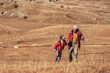 © Mediteraneo - Senior man with grandson on country walk in autumn.