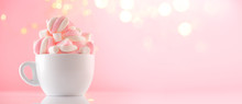 Marshmallow. Close-up Of Marshmallows Colorful Chewy Candy, Over Pink Bokeh Background, Closeup. Sweet Holiday Food Dessert In A Cup With Hot Chocolate Close-up. Candies