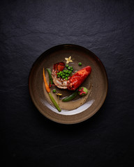 beautiful and tasty food on a plate, exquisite dish, creative restaurant meal concept.