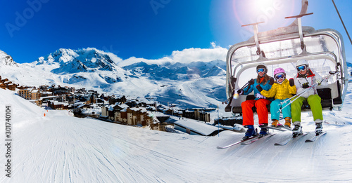 Fotomural Ski in winter season, mountains and ski touring equipments on the top in sunny day in France, Alps above the clouds