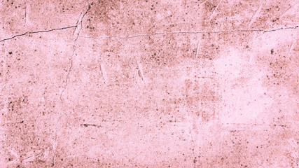 Wall Mural - Concrete grunge background in pink - beautiful contrasting texture of a cement surface with cracks in a dirty pink color