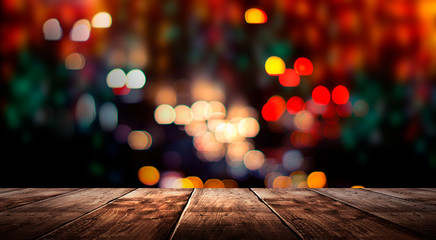 wooden table, blurred bokeh background background. neon light, night view, close-up. the general bac