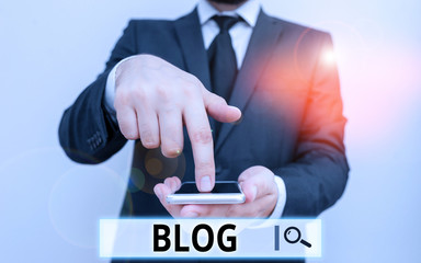 Aufkleber - Text sign showing Blogquestion. Business photo text regularly updated website web page run by individual Male human wear formal work suit hold smart hi tech smartphone use one hand