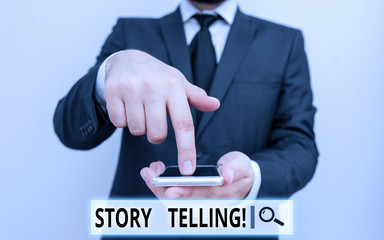 Poster - Text sign showing Story Telling. Business photo text activity writing stories for publishing them to public Male human wear formal work suit hold smart hi tech smartphone use one hand