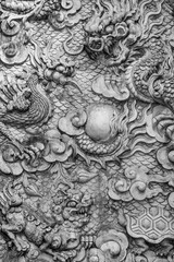 Marble carvings on the walls of a temple at the Marble mountains, Da Nang, Vietnam.