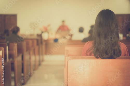 Fotografía Back view of Girl in Church