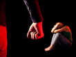 © Aleksej - Man shows fist in front of woman. People, family violence and crime concept