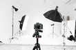 © prochkailo - Empty photo studio with lighting equipment and camera